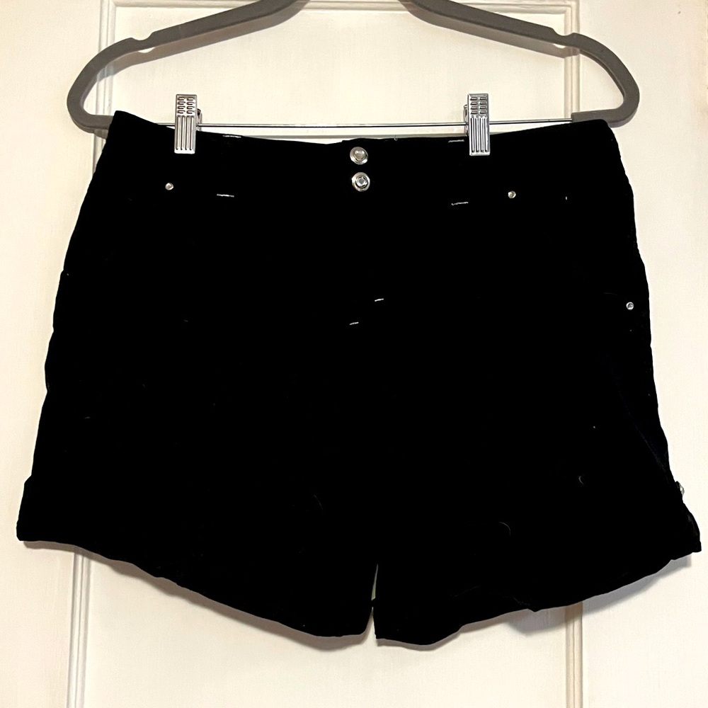 INC brand, silver thread, rolled cuff black shorts. Size 6.